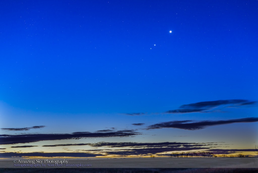 Four planets in the morning sky, on October 20, 2015, along the ecliptic from bottom to top: - Mercury (close to the horizon at lower left) - Mars (dim, below Jupiter) - Jupiter (fairly bright at upper right) - Venus (brightest of the four) I shot this from home in southern Alberta. This is a composite stack of 5 exposures from 8 seconds to 1/2 second to contain the range of brightness from the bright horizon to the dimmer sky up higher. All with the 35mm lens and Canon 6D at ISO 800.