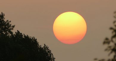 La puesta de Sol desde Denderleeuw, Bélgica