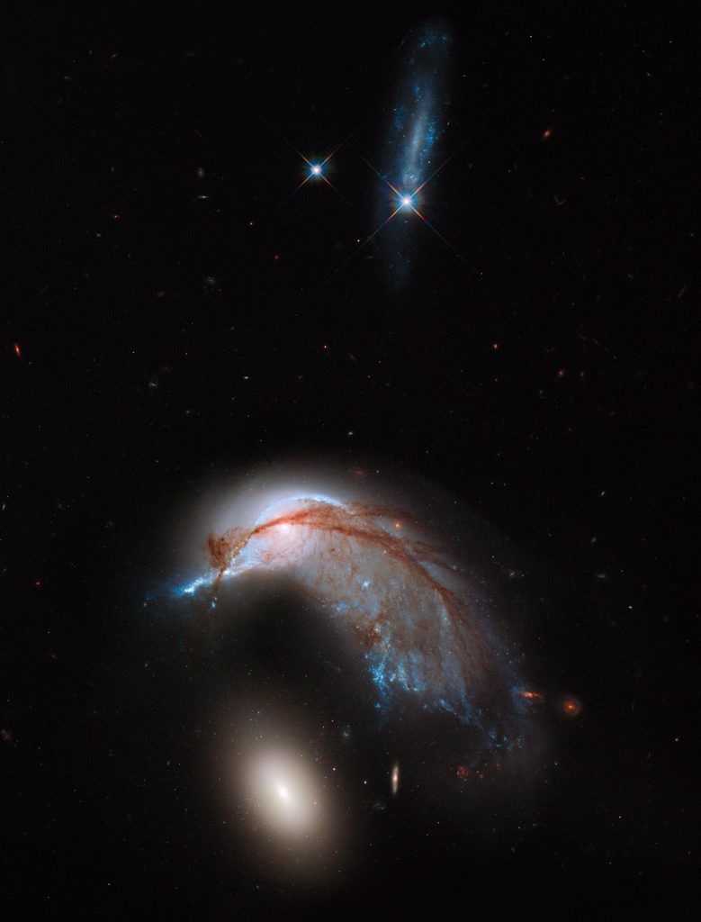 El encuentro cercano entre la Galaxia del Pingüino y NGC 2937