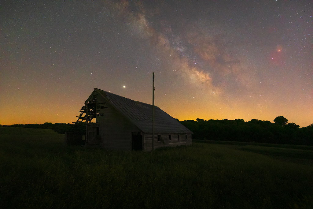 Abandoned barn and the Milky Way